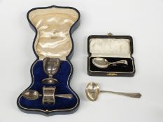 Mappin & Webb cased hallmarked silver christening set comprising egg cup, napkin ring and spoon,