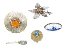 A Scottish brooch engraved with thistles, silver brooch in the form of a tennis racquet, white metal