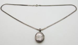 Victorian silver locket with engraved bird decoration by James Fenton, Birmingham 1884, on silver