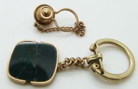 A 9ct gold key ring set with bloodstone and a 9ct gold stud
