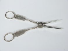 A pair of 19thC hallmarked silver fiddle and thread pattern grape scissors, marks indistinct but