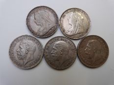 Five English crowns comprising 1895 and 1894 veiled heads and three George V 'rocking horse' crowns
