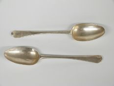 A pair of Georgian bottom hallmarked silver rat tail tablespoons, London circa 1760 but date