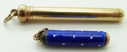 A yellow metal propelling pencil marked with an M and a propelling pencil set with blue enamel
