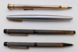 Four pens and propelling pencils comprising Shaeffer fountain pen with stainless steel barrel and