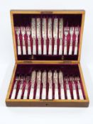 Cased set of mother of pearl handled hallmarked silver ferruled fruit knives and forks