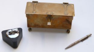Victorian brass casket raised on ball and claw feet, triangular Ronson lighter and a hallmarked