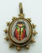 Victorian pendant set with micro mosaic depicting a fly/ insect, with glass compartment verso, 4.5 x