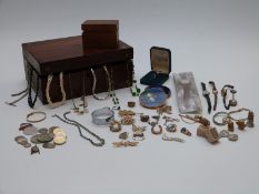 A collection of costume jewellery including a yellow metal chain, faceted French jet beads, 9ct gold