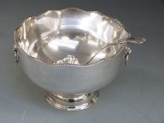 A large silver plated punch bowl, width 35cm and Elkington ladle