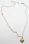 A 9ct gold chain and a 9ct gold heart locket, 6.7g