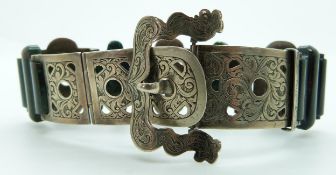 Victorian buckle bracelet of engraved silver links set with blood agate