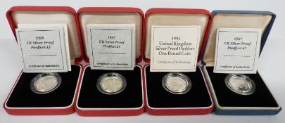 Four silver proof Piedfort one pound coins issued by the Royal Mint comprising 1987, 1993, 1997