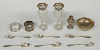 A set of six Goldsmiths and Silversmiths Co Ltd hallmarked silver teaspoons, silver-mounted cut