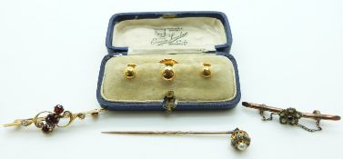 Three 9ct gold dress studs in fitted case, 9ct gold brooch set with an amethyst and seed pearls,