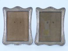 A pair of George V hallmarked silver photograph frames to suit 8 x 6in photo, Birmingham 1918