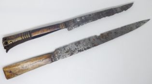 Two medieval bone handled knives, one with brass mounts, 16thC or earlier.