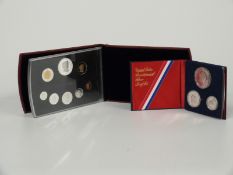Two silver proof coin sets comprising 1976 USA Bicentennial Dollar, half and quarter together with a