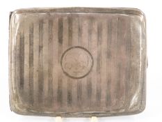 A curved hallmarked silver cigarette case. Chester 1912 maker Cohen & Charles, weight 98g.