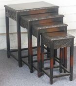 Chinese nest of four tables with carved friezes, W51 x D37 x H64cm