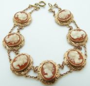 A 9ct gold bracelet set with shell cameos, 13g