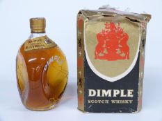A bottle of John Haig & Co old blended Dimple Scotch whisky, 26 2/3 fl oz, 70% proof, in original