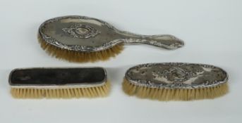 Three hallmarked silver mounted dressing table items