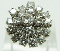 An 18ct white gold ring set with a large cluster of diamonds totalling approximately 2.8ct, with