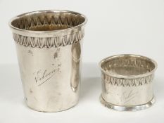 Small German white metal beaker marked 800, height 6cm, and a similarly marked napkin ring, 50g