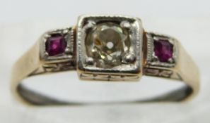 Art Deco ring set with an old cut diamond of approximately 0.3ct and two rubies, size K