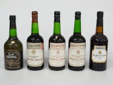 Five bottles of sherry comprising four Harveys including Bristol cream and Copper Beech, three being