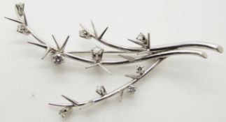 An 18ct white gold brooch set with diamonds by Strand