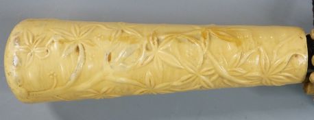 A 19thC/20thC parasol with faux ivory handle, 74cm