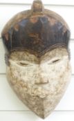 A 19thC / 20thC African tribal mask, height 28cm