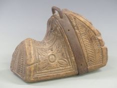 An 18th/19thC carved wooden metal bound Spanish or Argentinian stirrup, height 22cm