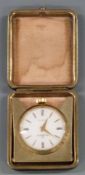 Mid twentieth century cased travel clock by The Home Watch Co. With 8 day Swiss movement. White