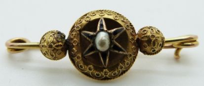 Victorian brooch set with a pearl and enamel