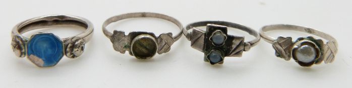 Four silver children's rings