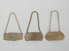 A set of three modern Elizabeth II hallmarked silver bottle tickets for whisky, gin and port, each