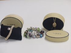 A silver necklace and silver bracelet in Links of London boxes and two Pandora style bracelets.