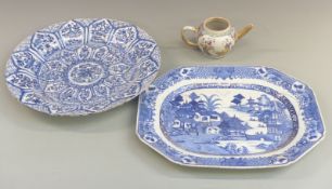 A 19th century Chinese porcelain charger, large willow pattern plate and a Chinese teapot, largest