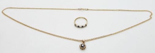 A 9ct gold necklace set with a sapphire and diamonds and a 9ct gold ring set with diamonds and