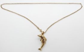 A 9ct gold articulated pendant in the form of a dolphin set with paste on 9ct gold chain, 7.83g