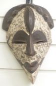 A 19thC / 20thC African tribal mask, height 30cm