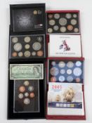 Royal Mint deluxe cased brilliant uncirculated coin sets comprising 2005, 2007, 2008 and a further