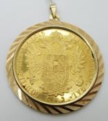 A hallmarked silver medallion, two silver St Christophers, two silver rings set with tiger's eye,