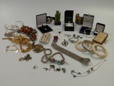 A collection of silver jewellery including bangles, necklace, bracelet, locket, citrine necklace and