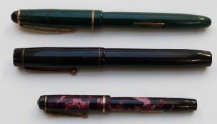 Three vintage fountain pens comprising Conway Stewart Dinkie No. 510 with marbled barrel and cap