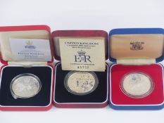 Royal Mint UK silver proof crowns comprising 1977, 1953-93 anniversary and a 1997 example, all case,