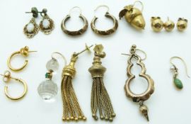 A collection of earrings including Victorian examples